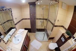 Kúpeľňa v ubytovaní OnHoliday Apartamenty w Hotelu przy ul Kościuszki 16