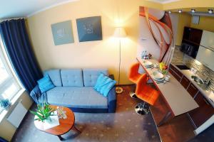 Kuchyňa alebo kuchynka v ubytovaní OnHoliday Apartamenty w Hotelu przy ul Kościuszki 16