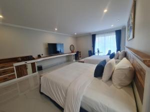 Postel nebo postele na pokoji v ubytování Sabina Luxury Boutique Hotel & Villa