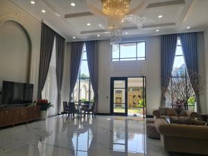 TV a/nebo společenská místnost v ubytování Sabina Luxury Boutique Hotel & Villa