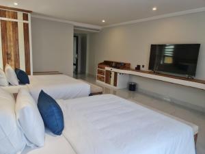 Postel nebo postele na pokoji v ubytování Sabina Luxury Boutique Hotel & Villa