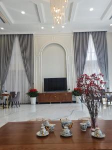 TV a/nebo společenská místnost v ubytování Sabina Luxury Boutique Hotel & Villa