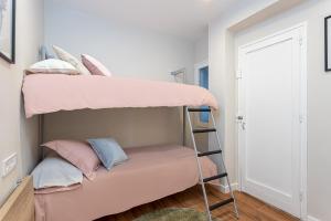 Postel nebo postele na pokoji v ubytování Sant Martí Apartment by Olala Homes