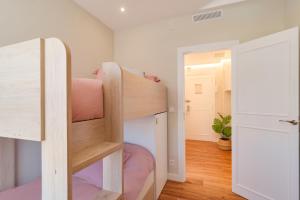 Postel nebo postele na pokoji v ubytování Sant Martí Apartment by Olala Homes + 14 fotografií