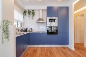 Kuchyň nebo kuchyňský kout v ubytování Sant Martí Apartment by Olala Homes