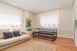 Posezení v ubytování Sant Martí Apartment by Olala Homes