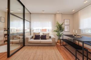 Posezení v ubytování Sant Martí Apartment by Olala Homes