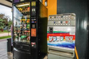a vending machine sitting next to a building at SleepOver Komatipoort in Komatipoort +21 photos