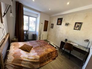 Postel nebo postele na pokoji v ubytování Chambres d'hôtes à la forge du Coglais