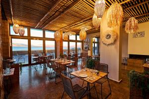 Veitingastaður eða matsölustaður á Miramare Magnetic Beach Hotel