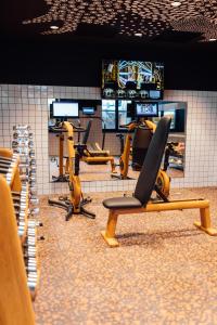 a gym with a row of chairs in a room at Mama Shelter Rennes in Rennes