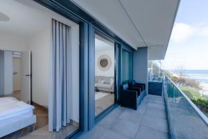 Postel nebo postele na pokoji v ubytování Resort Hevenia Rewal 9 + 40 fotografií