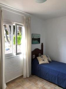 Posteľ alebo postele v izbe v ubytovaní Apartamento estilo Mediterráneo. Segundo Montañar.