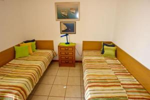 Postel nebo postele na pokoji v ubytování Apartments Zelimir