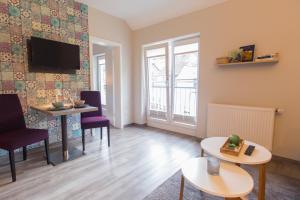 TV a/nebo společenská místnost v ubytování aparthotel Cochem