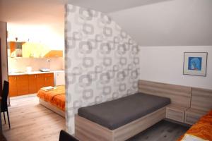 Postel nebo postele na pokoji v ubytování Penzion Era