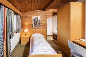 Postel nebo postele na pokoji v ubytování Hotel Waldheim