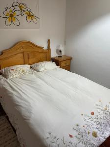 Postel nebo postele na pokoji v ubytování Casa Lomo Piñero