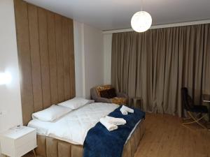 Giường trong phòng chung tại Solo Visit Apartments 1710 B +24 ảnh