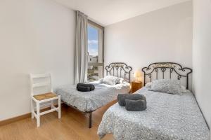 Posteľ alebo postele v izbe v ubytovaní Apartamento GAVINA 1B - a 400m de la playa
