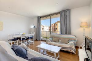 Posedenie v ubytovaní Apartamento GAVINA 1B - a 400m de la playa