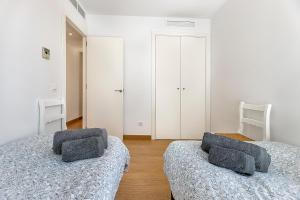 Posteľ alebo postele v izbe v ubytovaní Apartamento GAVINA 1B - a 400m de la playa