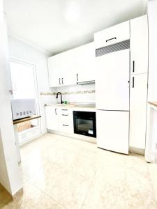 Kuchyňa alebo kuchynka v ubytovaní Piso recién reformado en centro + 11 fotografií