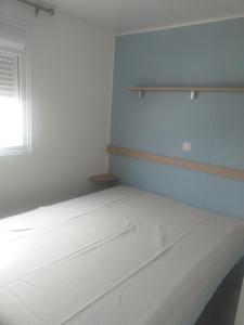 Postel nebo postele na pokoji v ubytování Camping La Maltournée