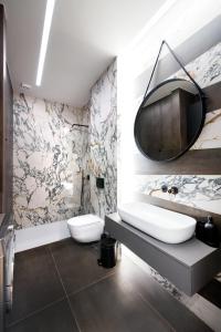 Ванна кімната в #Dahlia by halu! Apartments