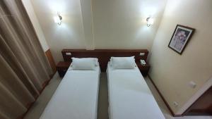 Cama o camas de una habitación en Sun Galicia Hotel y Apartamentos