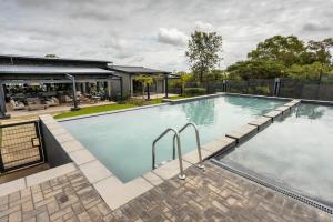 an image of a swimming pool in a house at Fore's Luxurious Home in Midrand