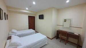 Postel nebo postele na pokoji v ubytování Sun Galicia Hotel y Apartamentos + 16 fotografií