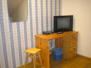 TV a/nebo společenská místnost v ubytování Madise Guesthouse