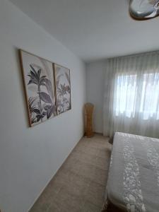 Postel nebo postele na pokoji v ubytování Résidence Maëlla