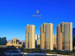 a view of a city skyline with tall buildings at Amalz 2 Bedroom 3 Bathroom Balcony Suites at Mgm Signature ! in Las Vegas