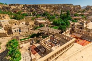 an aerial view of a town with a mountain at Kayata Cave Suites Special Class in Urgup