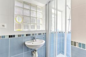 Kúpeľňa v ubytovaní Maison des Goélands - 50m de la plage