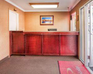 a waiting room with a desk in a building at Econo Lodge City Center in Portland
