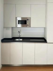 A kitchen or kitchenette at bt6gallos