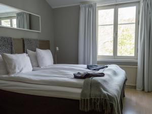 Postel nebo postele na pokoji v ubytování Skeviks Gård + 37 fotografií