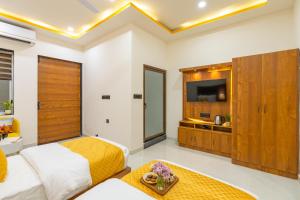 Ein Bett oder Betten in einem Zimmer der Unterkunft The Social Stays Jaipur formerly ArtBuzz