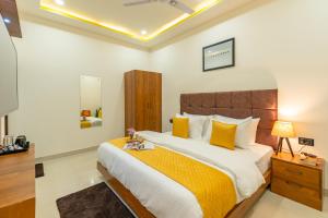 Ein Bett oder Betten in einem Zimmer der Unterkunft The Social Stays Jaipur formerly ArtBuzz