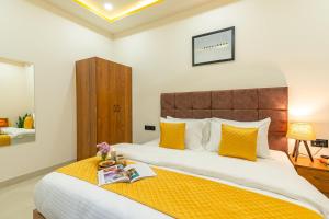 Ein Bett oder Betten in einem Zimmer der Unterkunft The Social Stays Jaipur formerly ArtBuzz