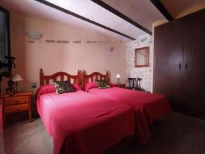 Posteľ alebo postele v izbe v ubytovaní Casa Rural Mirador de la Torre
