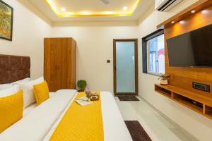 TV/Unterhaltungsangebot in der Unterkunft The Social Stays Jaipur formerly ArtBuzz