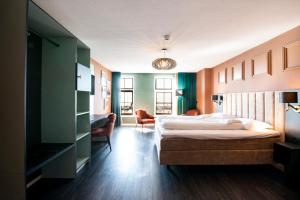 Letto o letti in una camera di Hotel Old Dutch