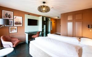 Letto o letti in una camera di Hotel Old Dutch