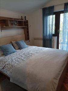 Posteľ alebo postele v izbe v ubytovaní Apartments Strmac
