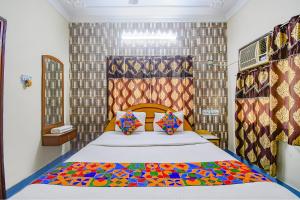 Postel nebo postele na pokoji v ubytování FabHotel Heritage Inn + 21 fotografií