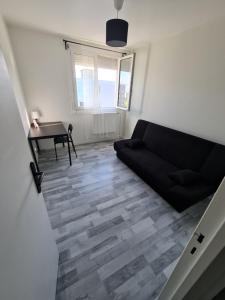 Posedenie v ubytovaní Grand appartement lumineux